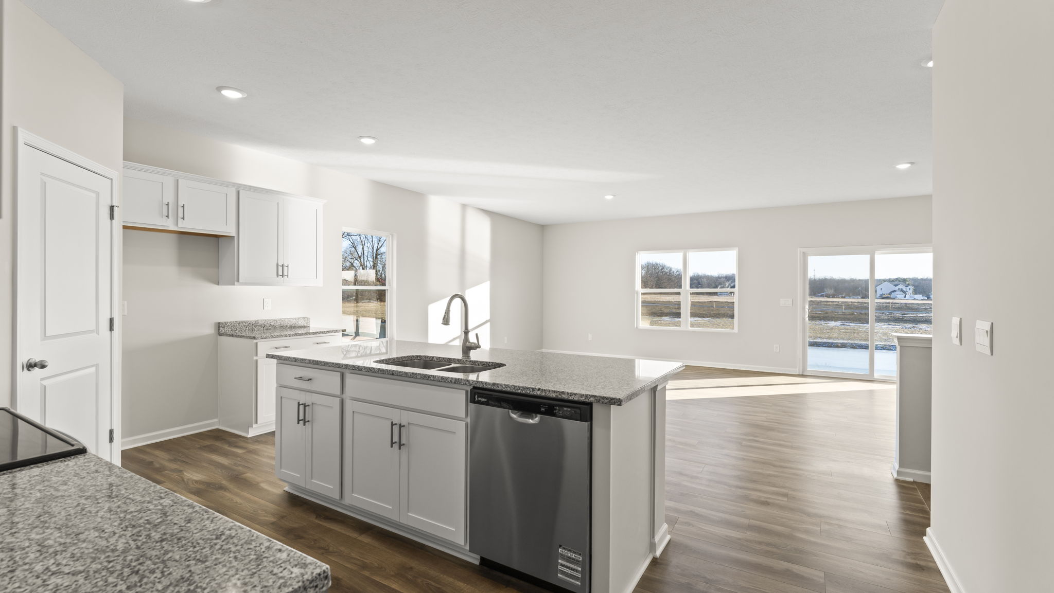 View of the kitchen and dining area from the hallway