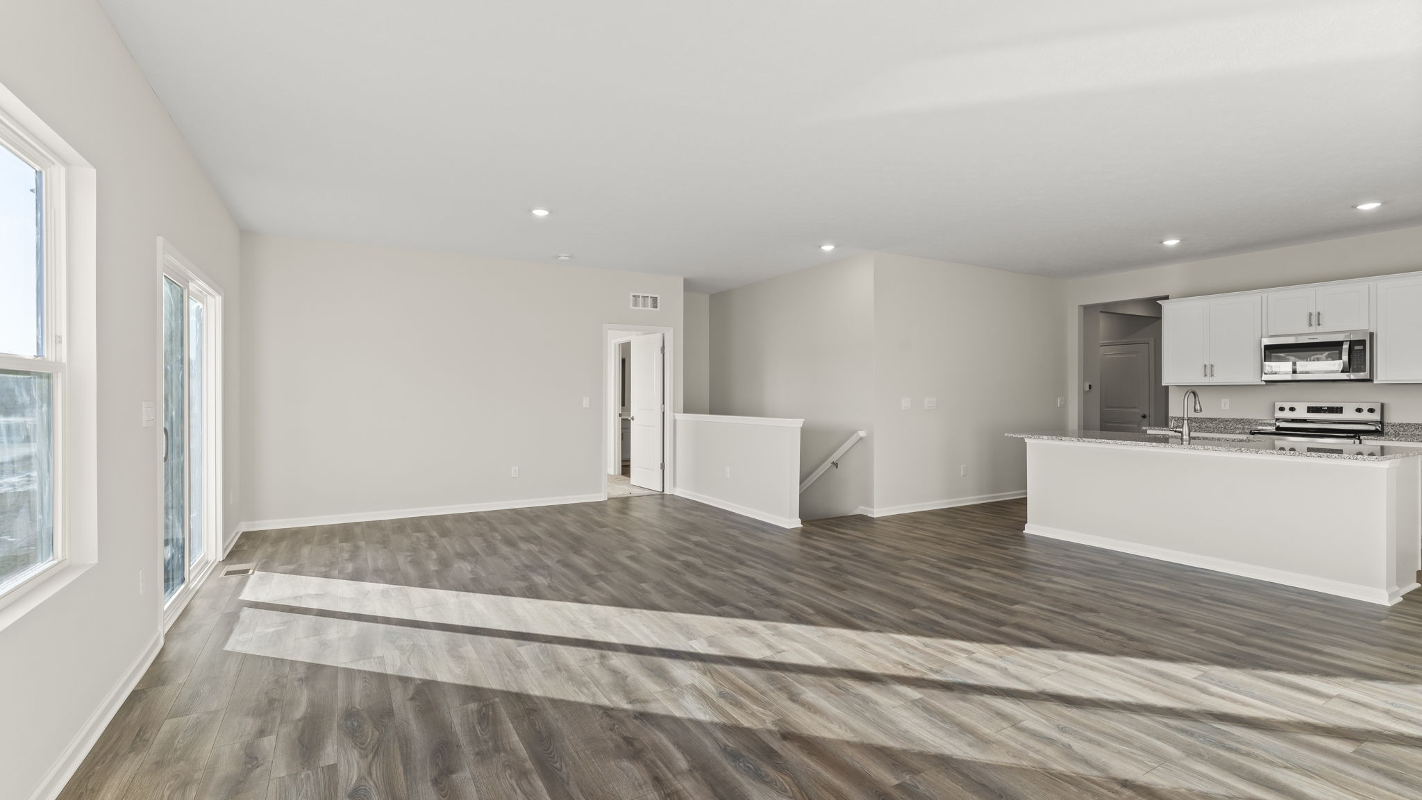 Great room with kitchen on the right