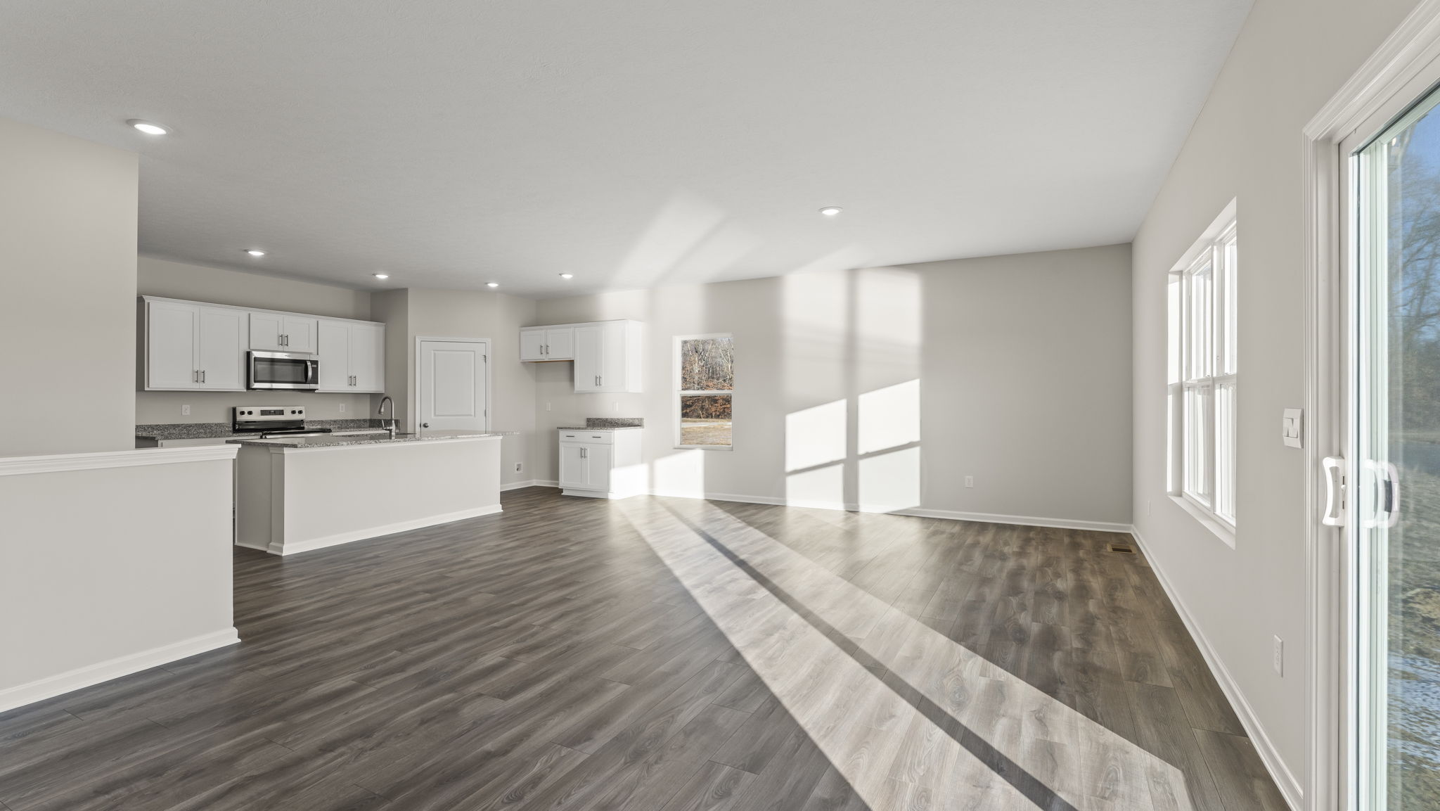 Full kitchen, dining, and living areas