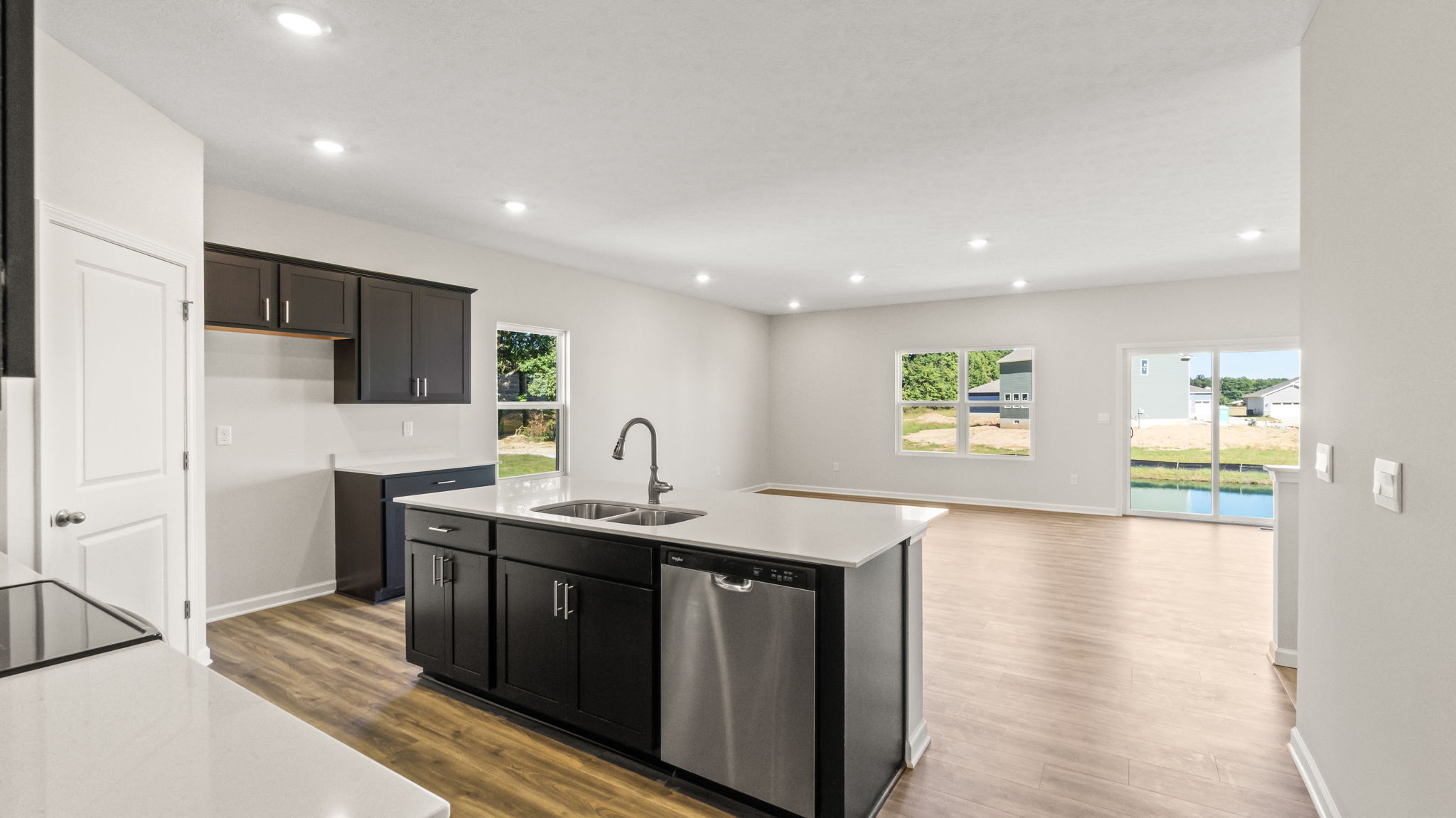 kitchen from behind island with view of great room