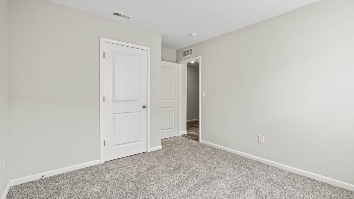 Bedroom looking into hallway