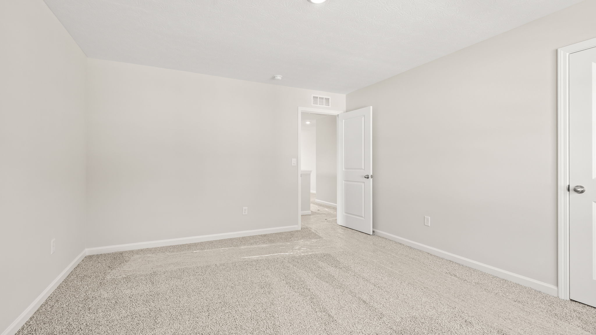 Carpeted bedroom