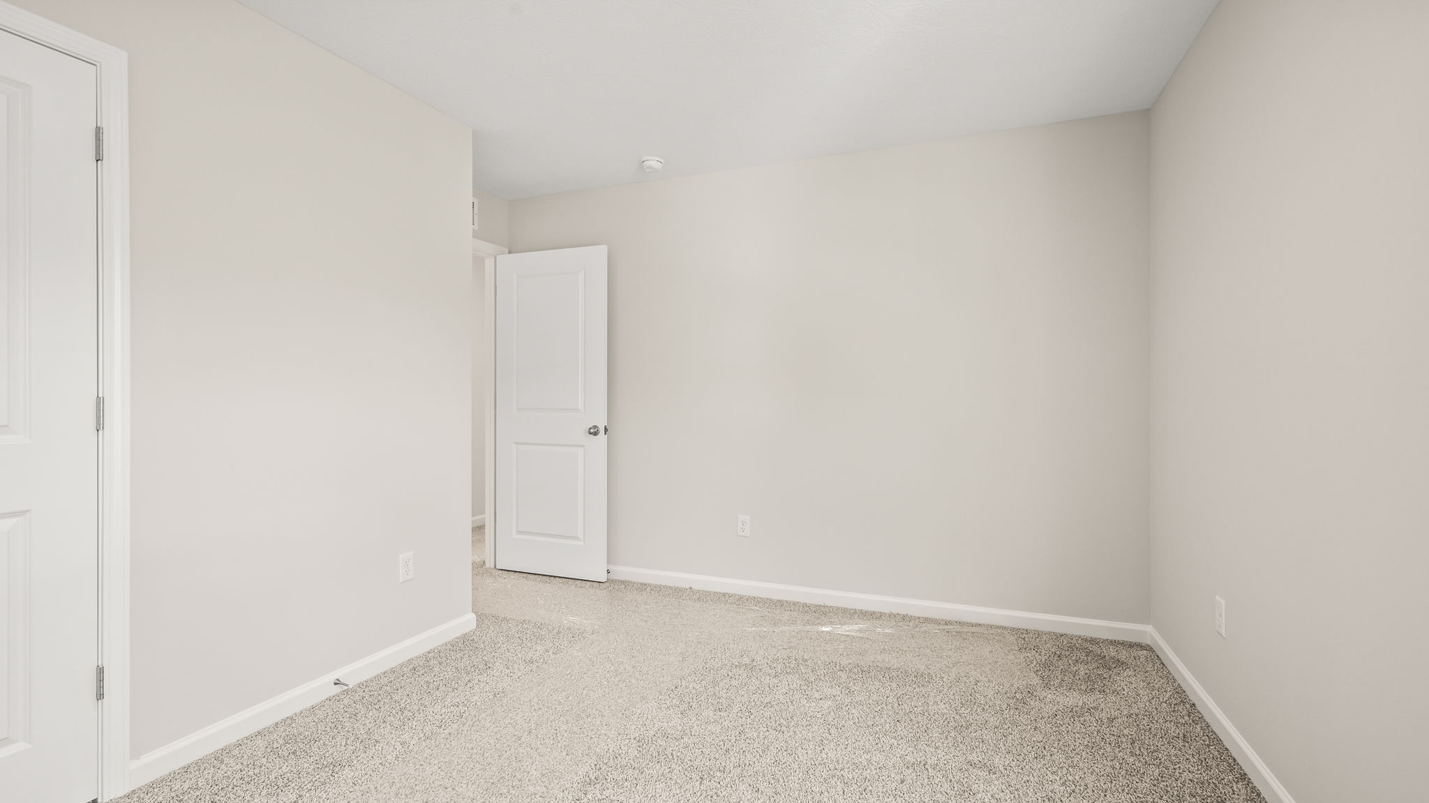 Carpeted bedroom