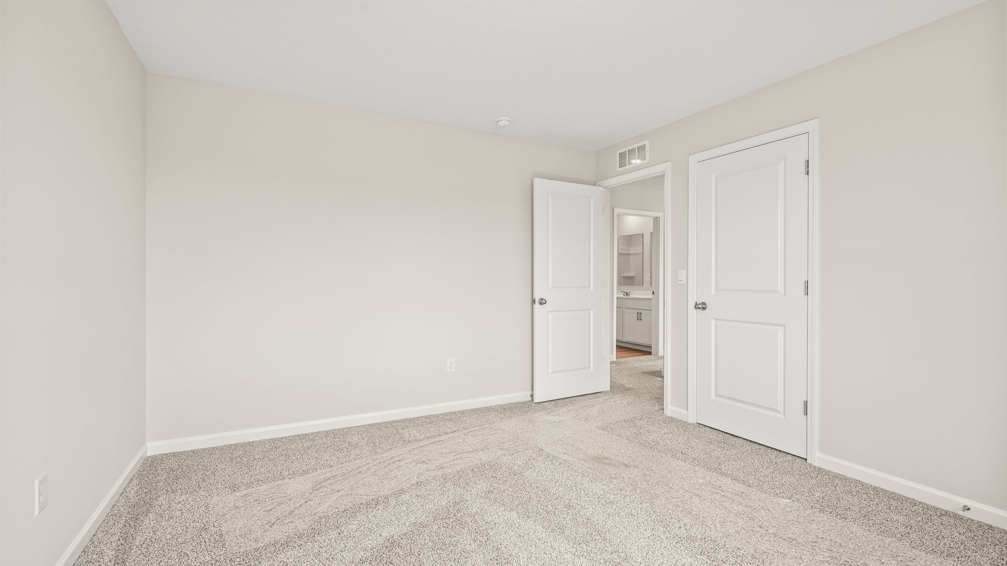 Carpeted bedroom