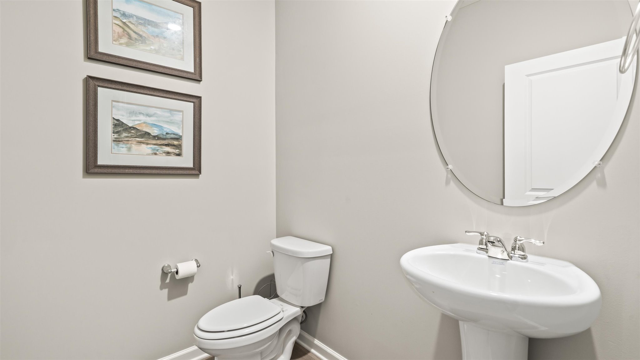 Powder room with sink and bathroom.
