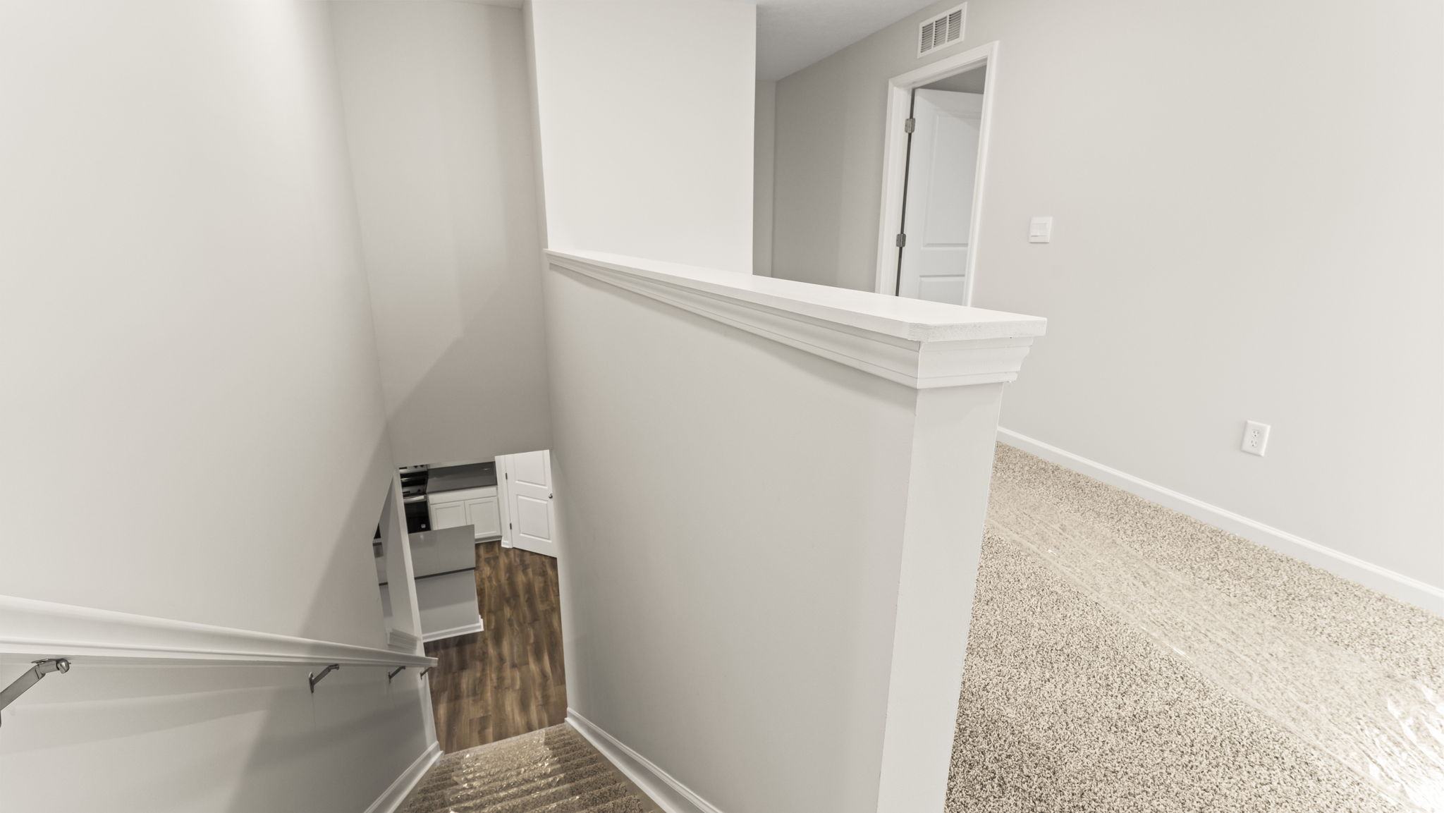Stairs leading to downstairs and 2nd level