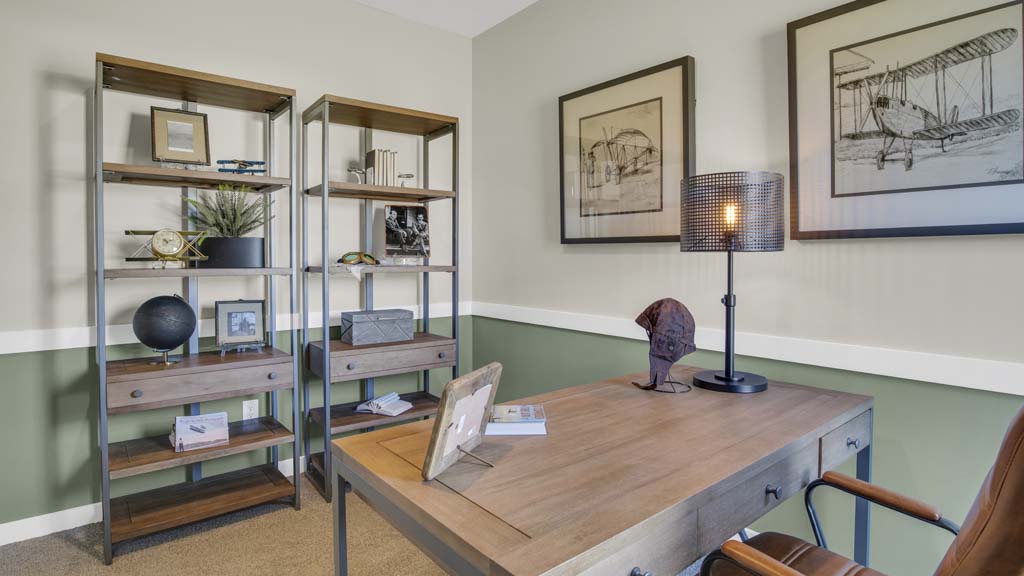 Bedroom shown as dayton air themed office.