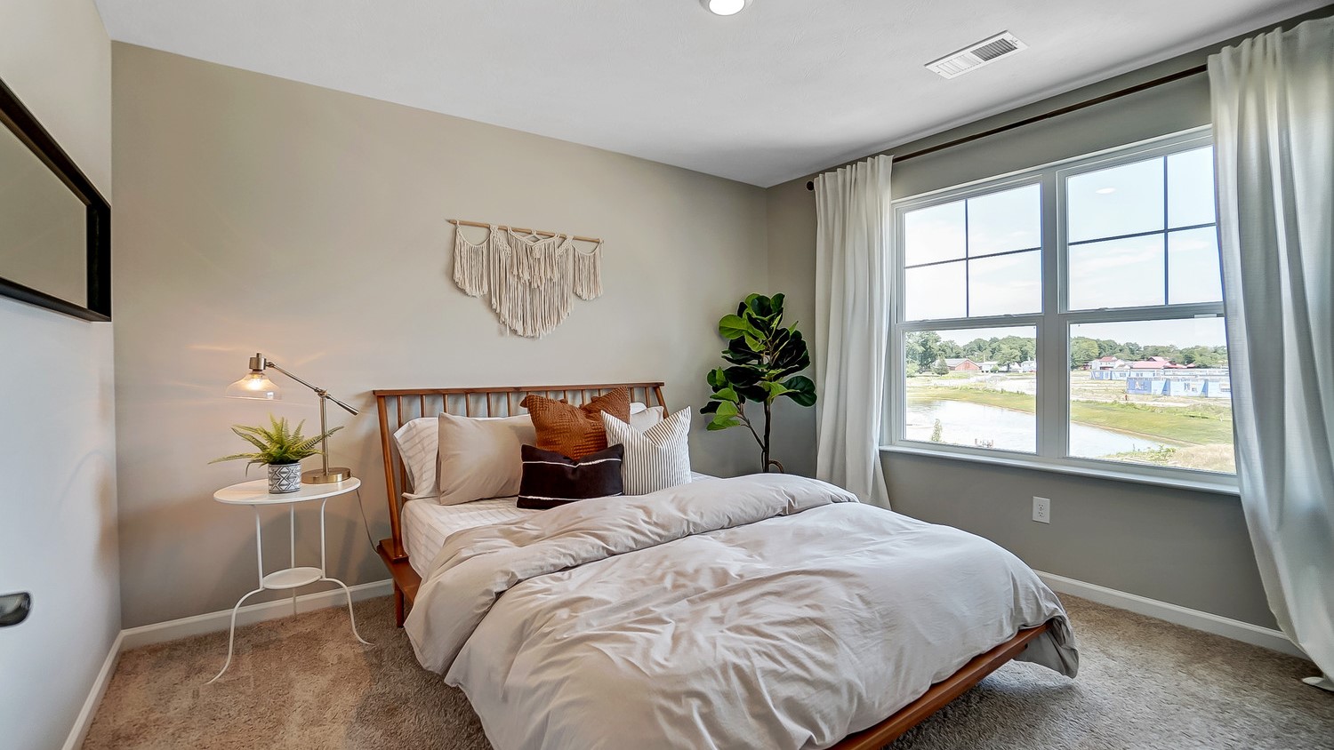 Bedroom 4 with gorgeous bed and decorations.