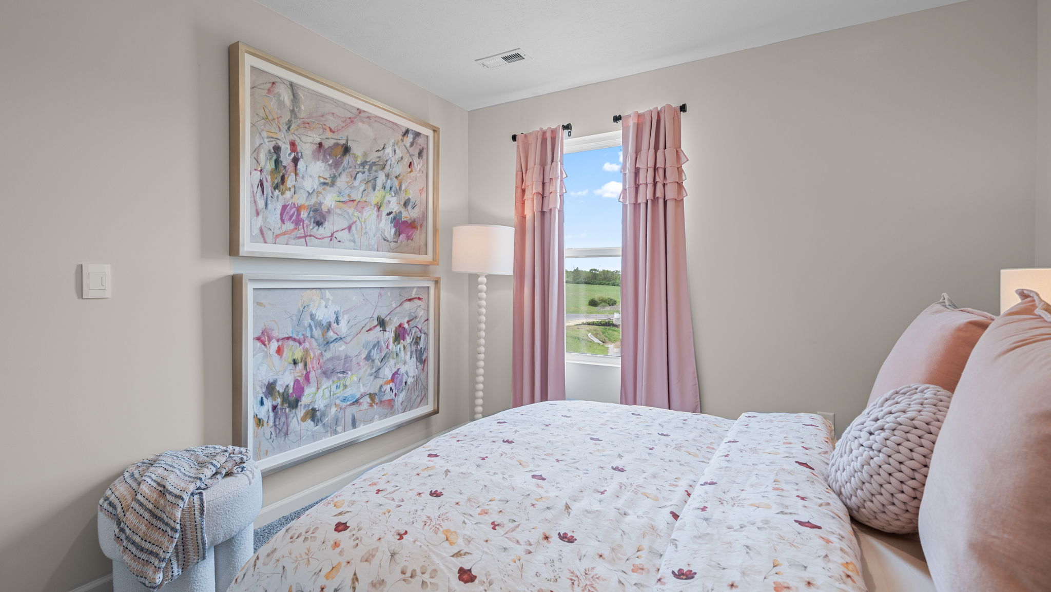 Bedroom with carpeted floors.