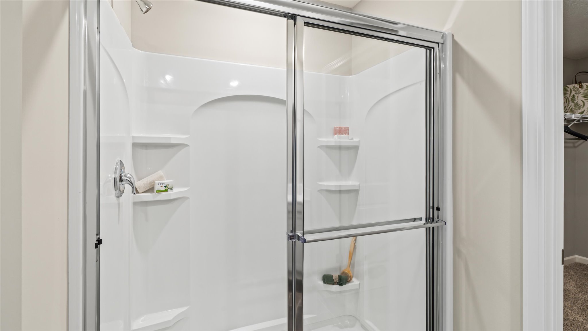 close up of shower in primary bathroom.