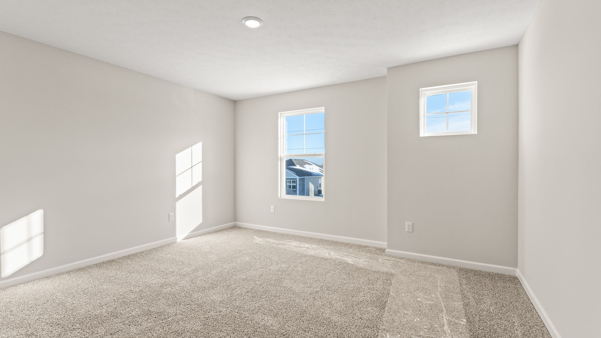 Bedroom with two windows