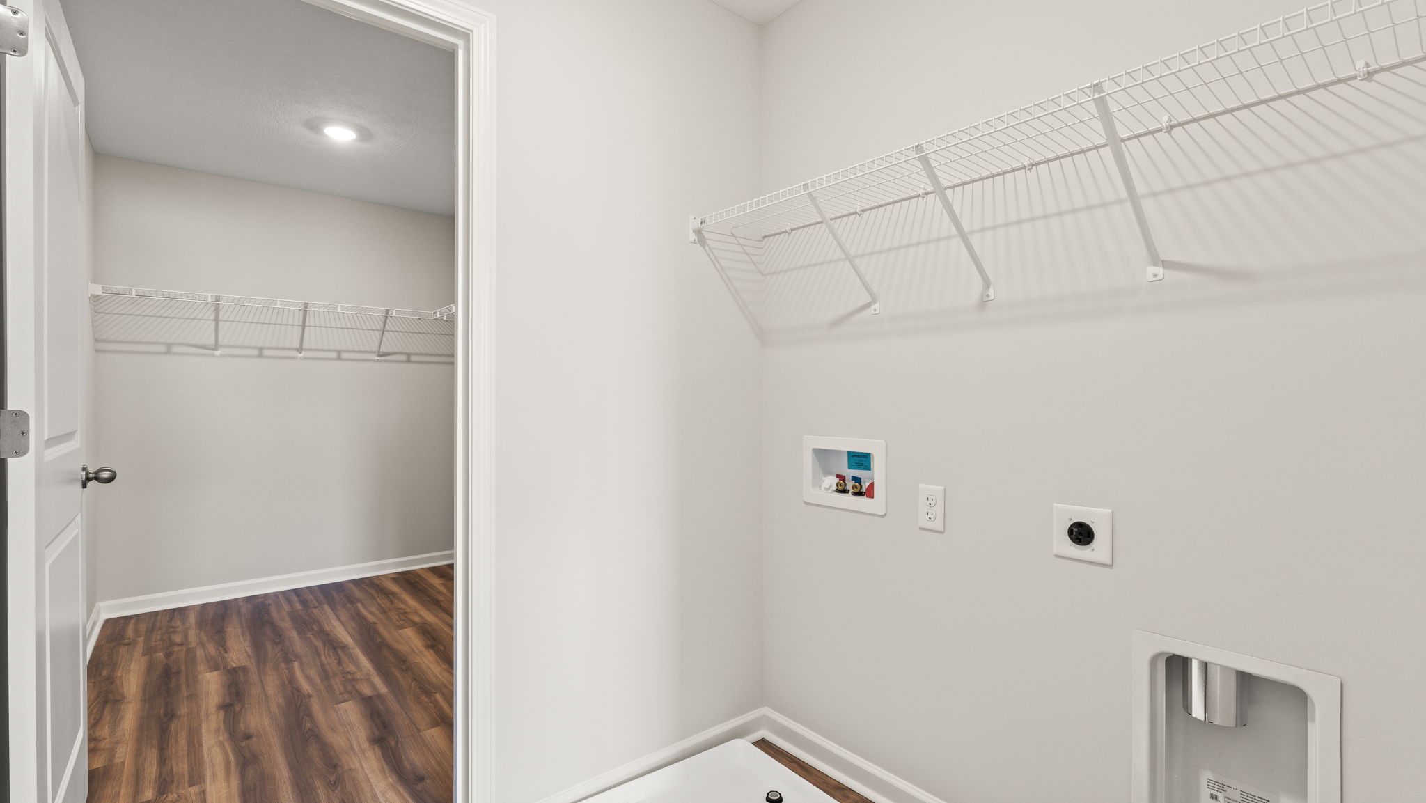 Laundry area with washer/dryer inlets