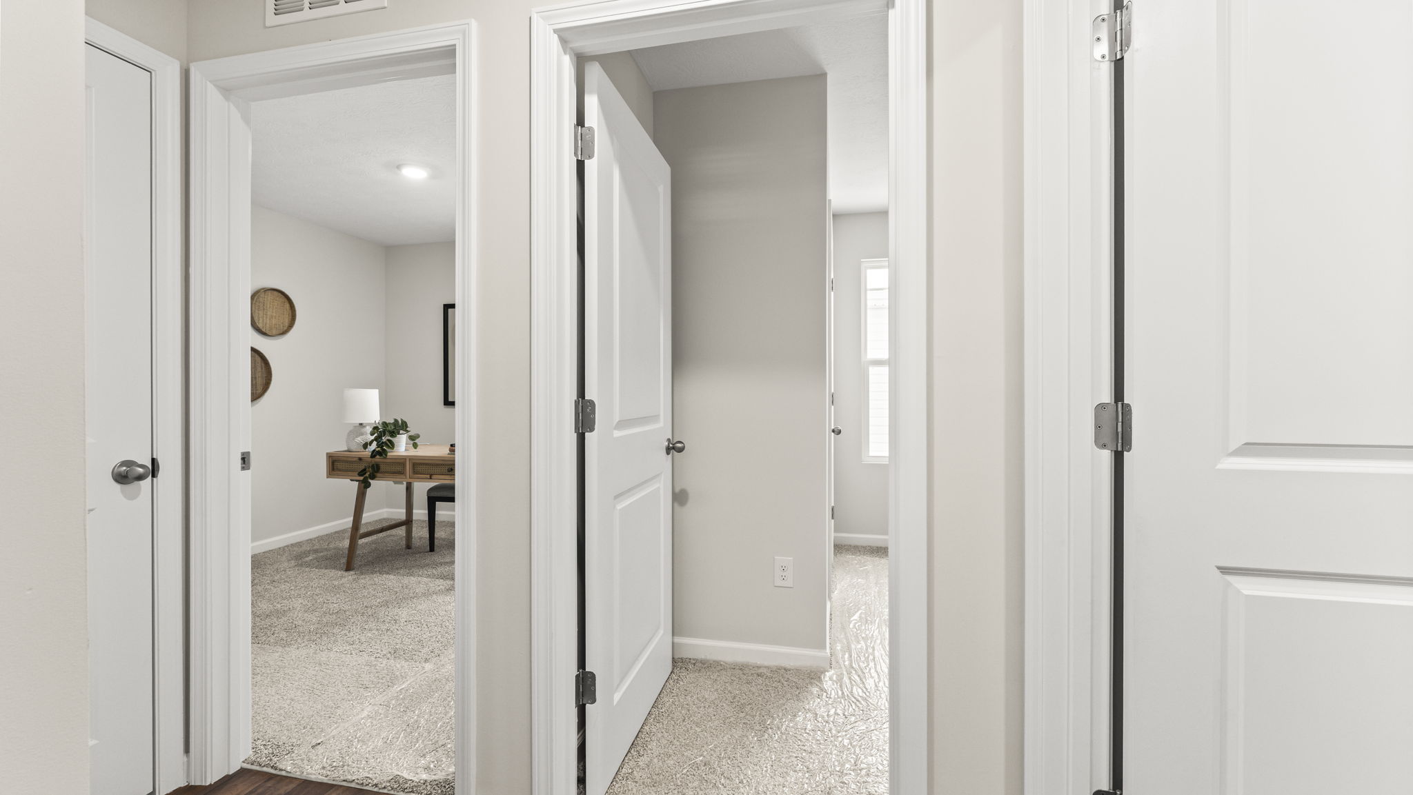 Bedroom 2 and 3 flex-office, study, entertainment, game, craft or kids room options in this D.R. Horton new construction home