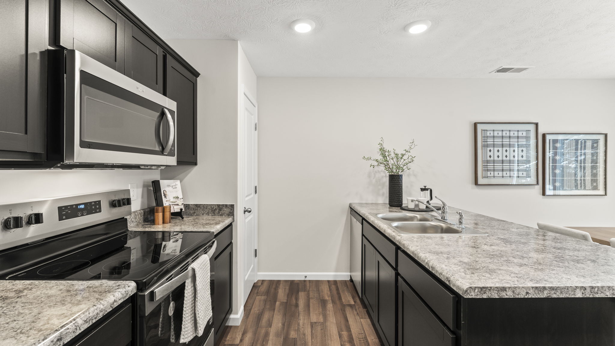 Central kitchen with sink and seating, anchoring your home with prep zones and pantry access