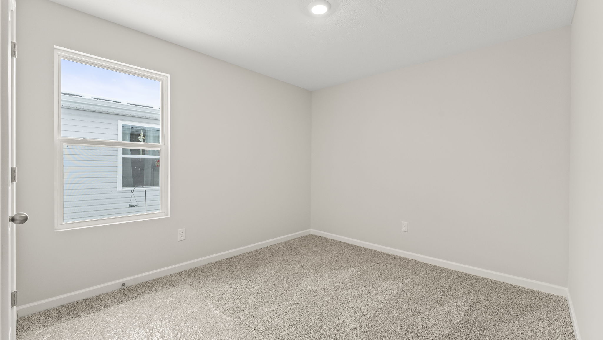 Bedroom 2, flex-office, study, entertainment, game, craft or kids room options in this D.R. Horton new construction home