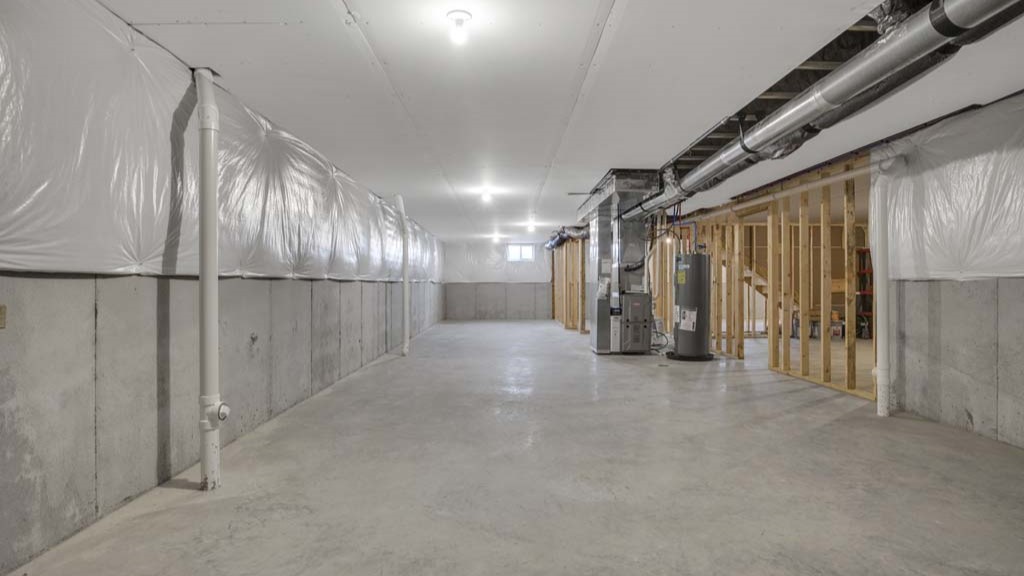 Shotgun view of the basement in full.