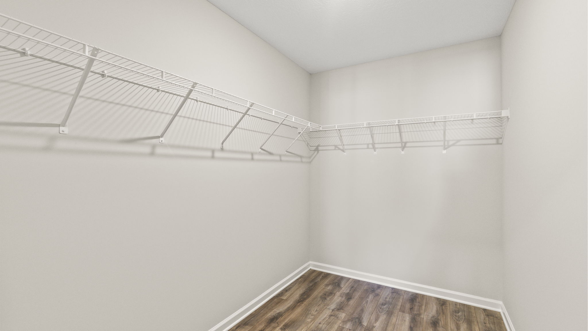 Walk-in storage area with wire shelving