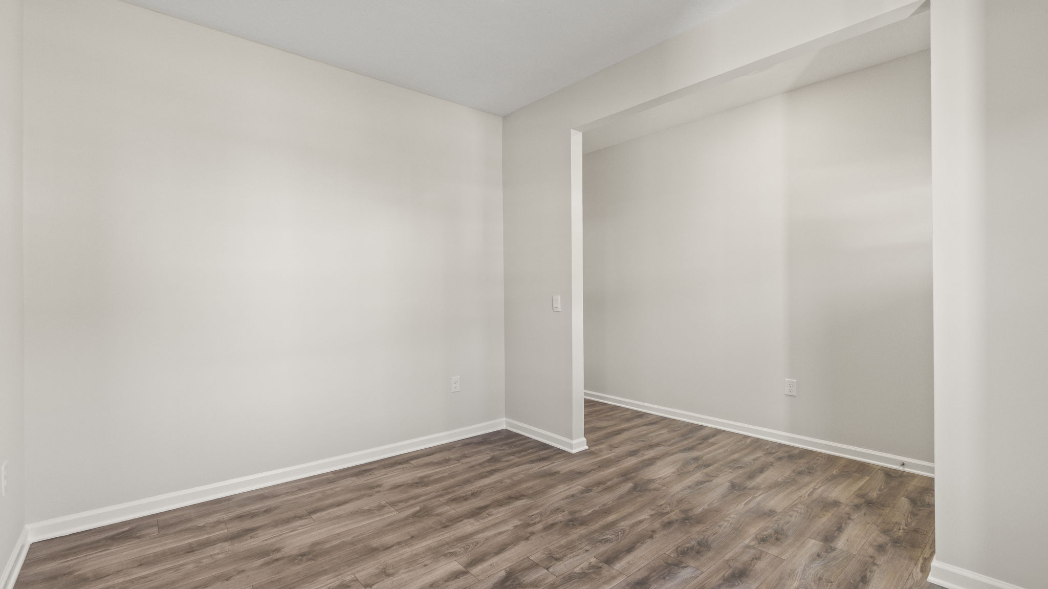 Flex room with woodcrest flooring