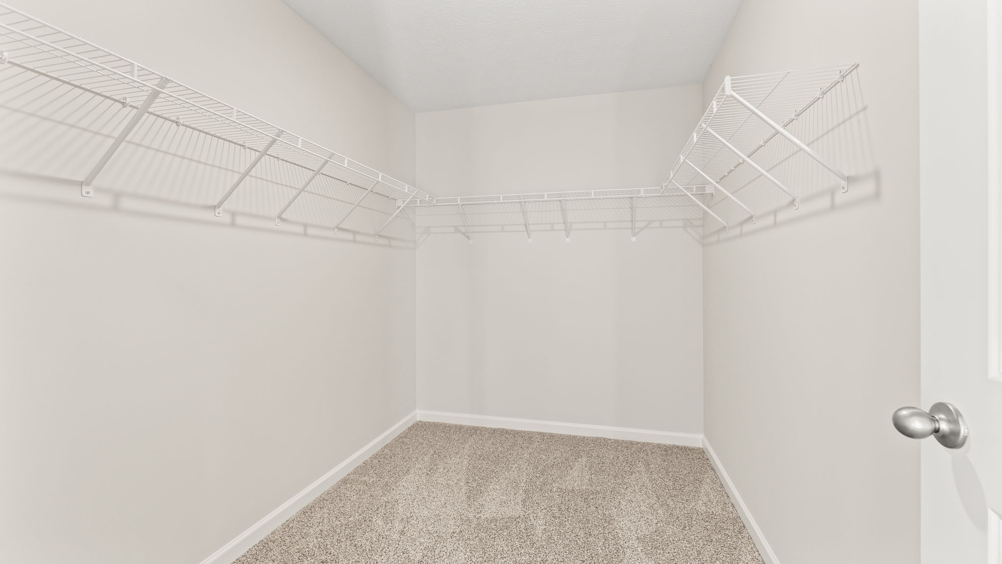 Walk-in closet with wire shelving
