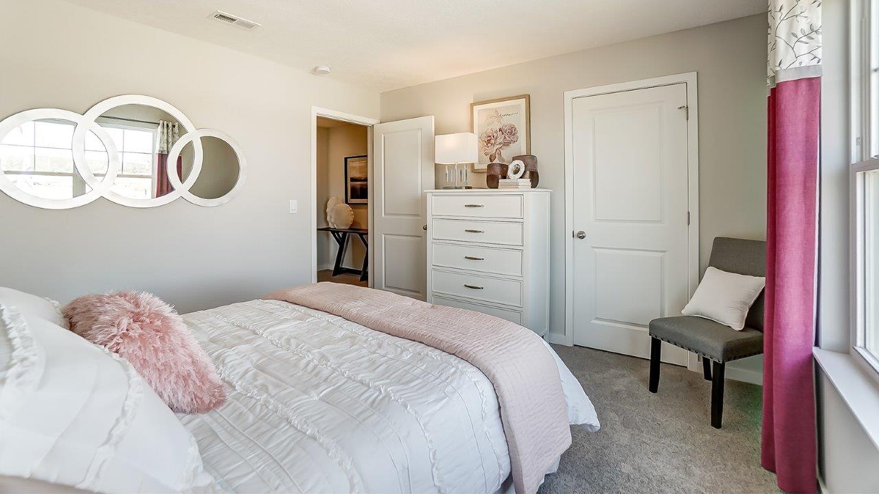 bedroom leading into hallway