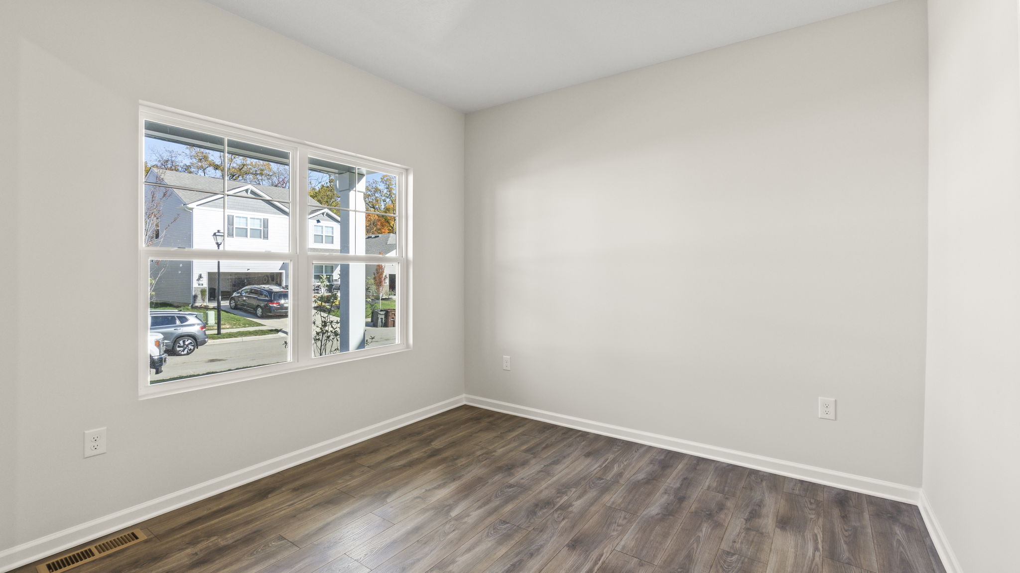 Flex room with woodcrest flooring