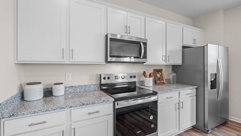 Kitchen with stainless steel appliances.