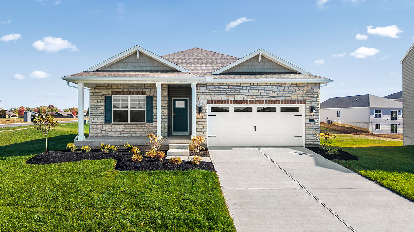 Exterior front of a spec home in grandstone trace.