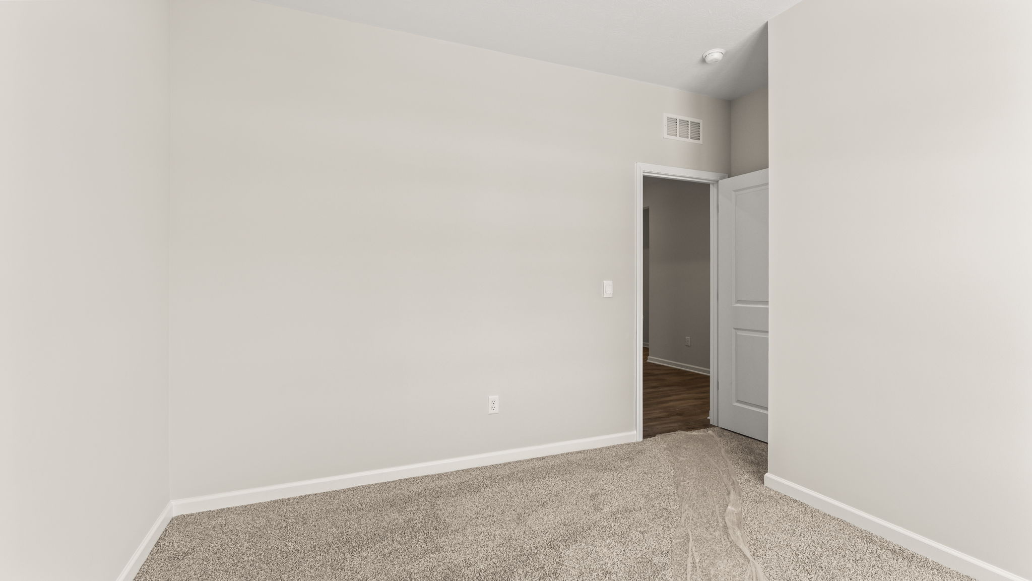 Bedroom looking into hallway