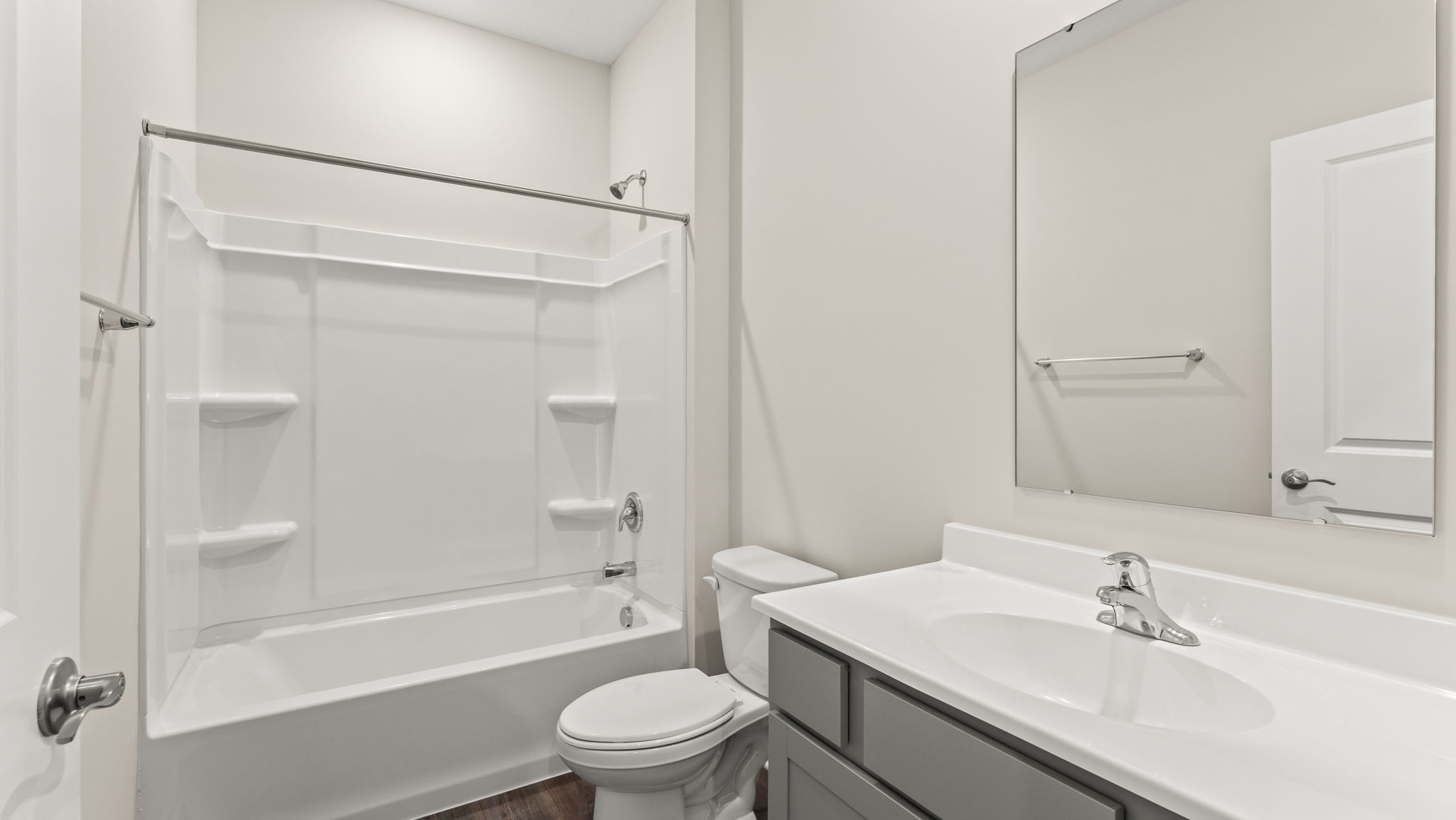 Bathroom sink, toilet, and tub