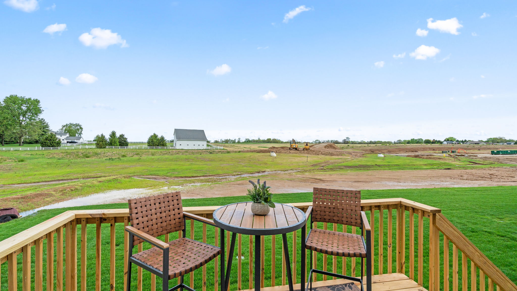 Backyard with wood deck.