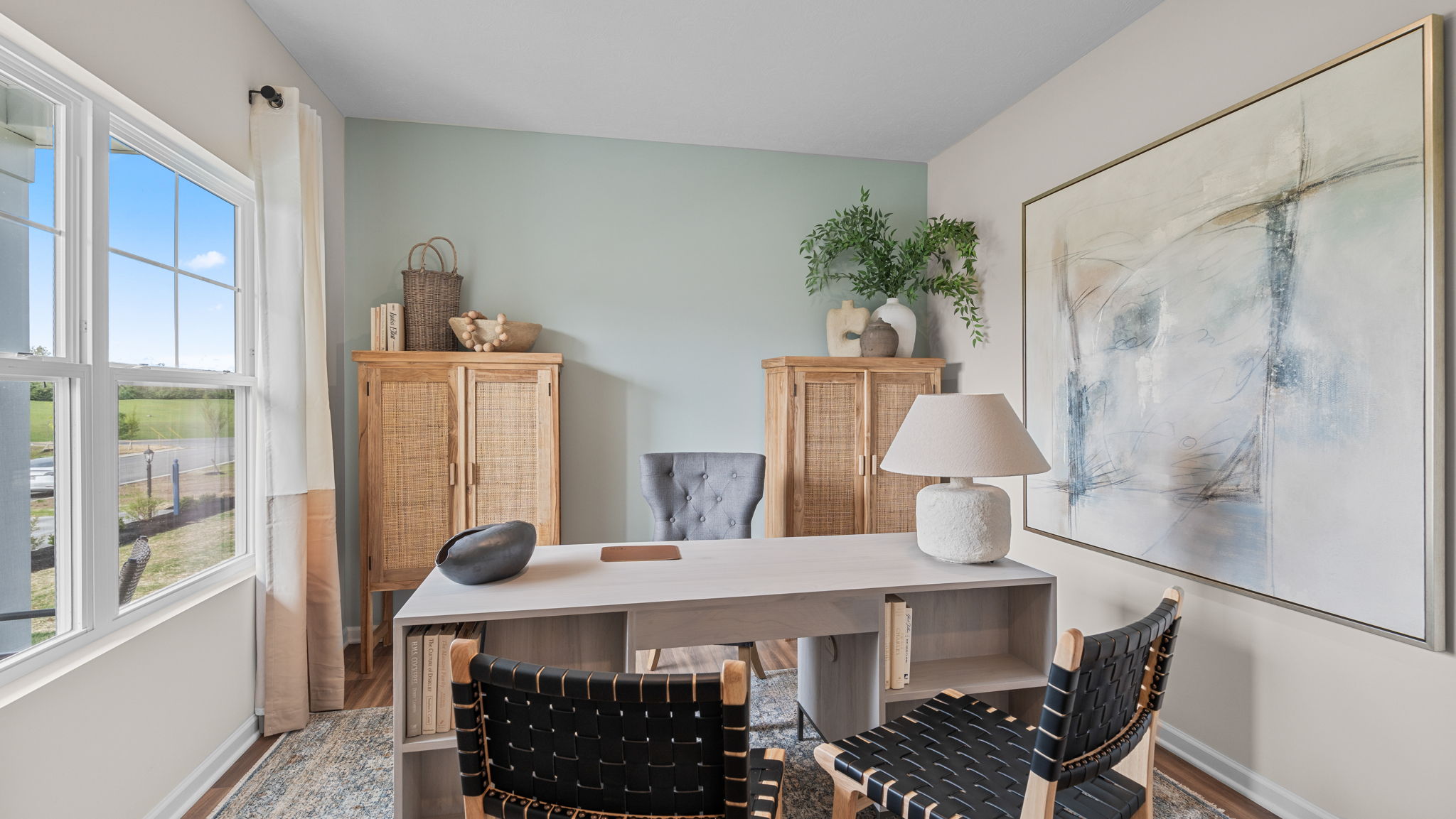 Optional flex room with wood like tile flooring.