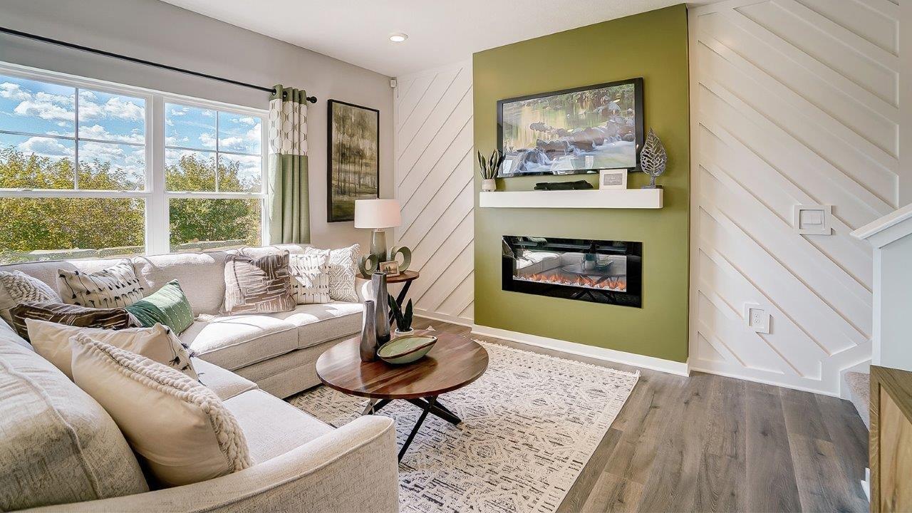 living room as a whole with large windows.