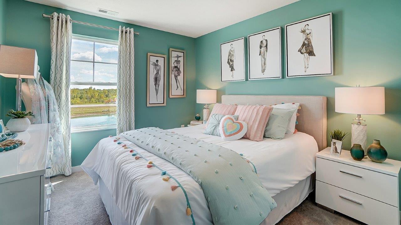 Bedroom 3 with light tones and design styled room.