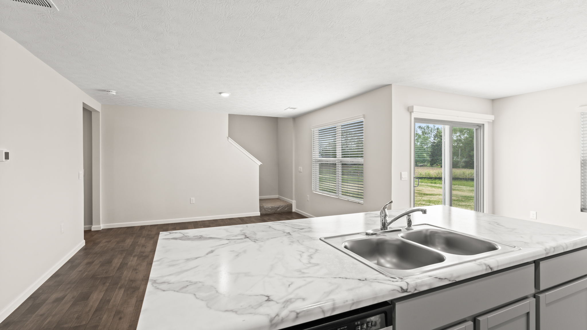 Perspective from the kitchen of the living area