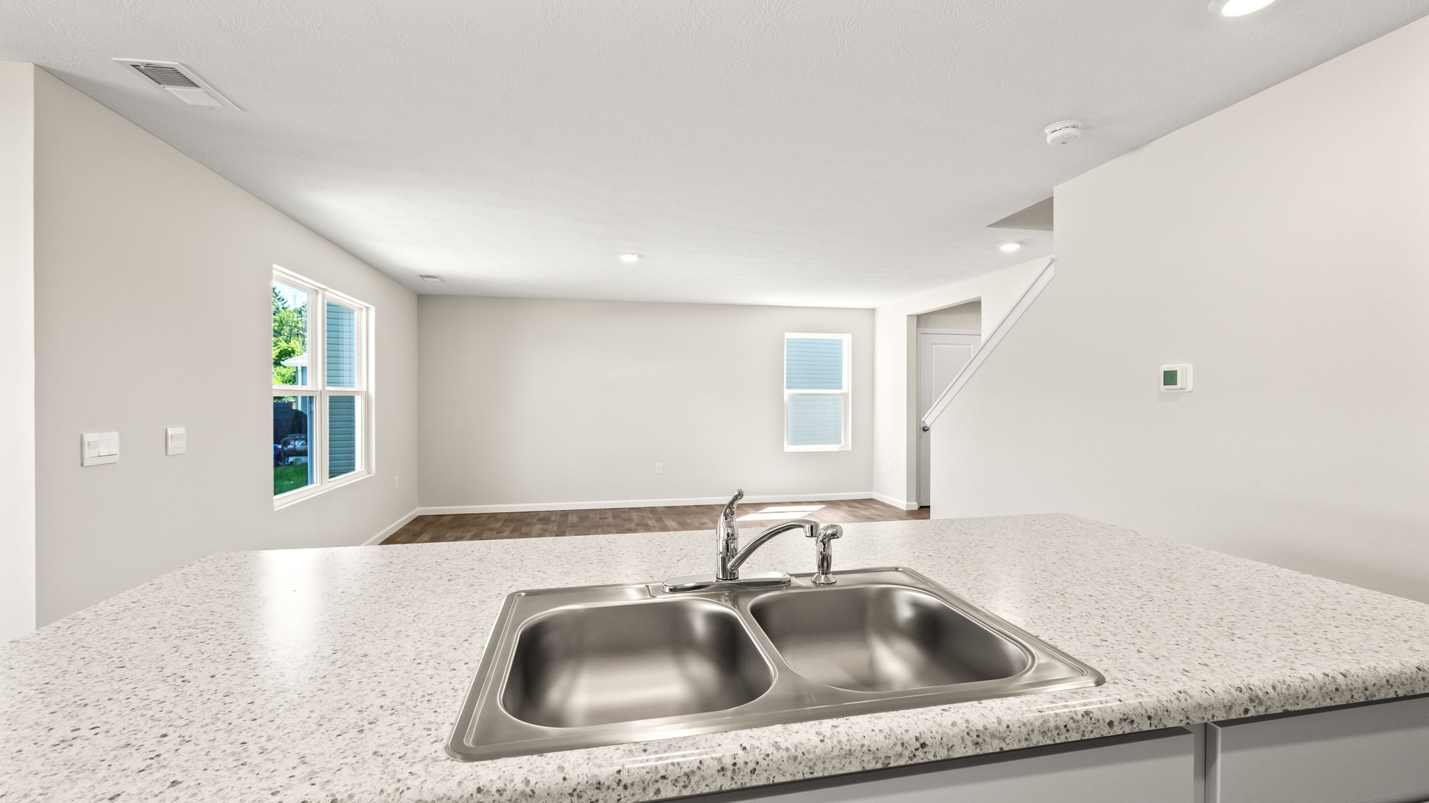 Perspective of kitchen island with sink