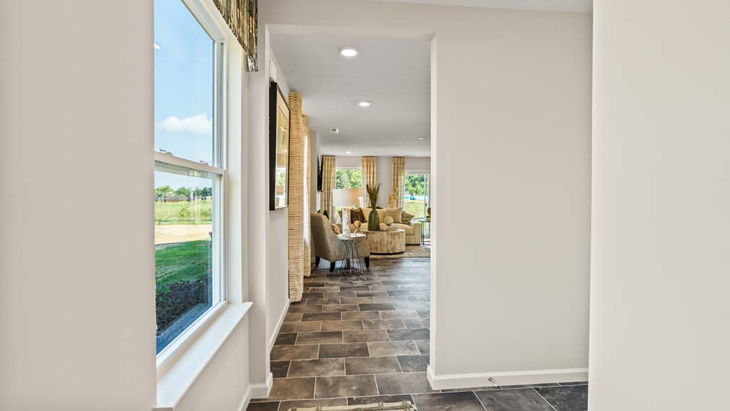Foyer with white walls and décor.