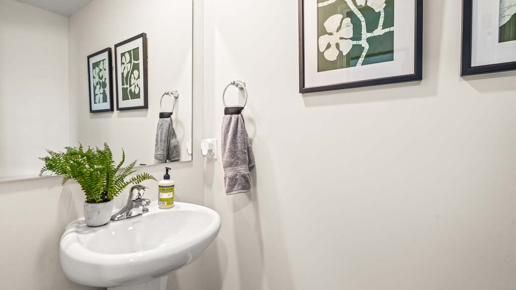 half bathroom with modern decorations.