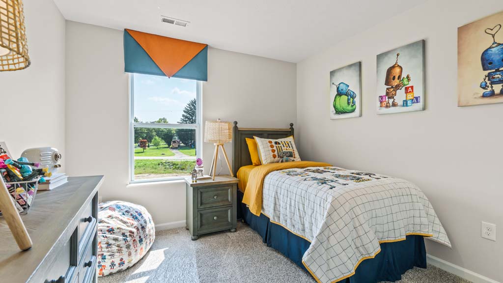 Bedroom with robot theme for young child.