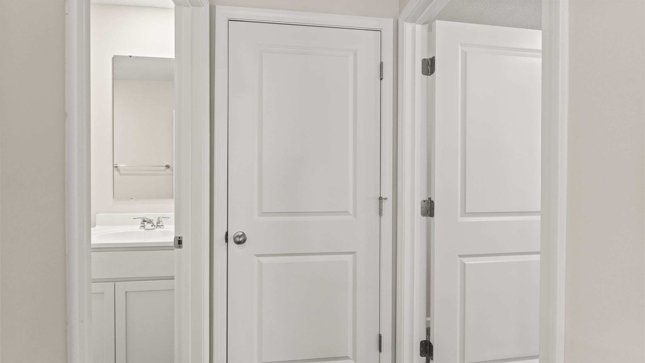 Hallway into bathroom