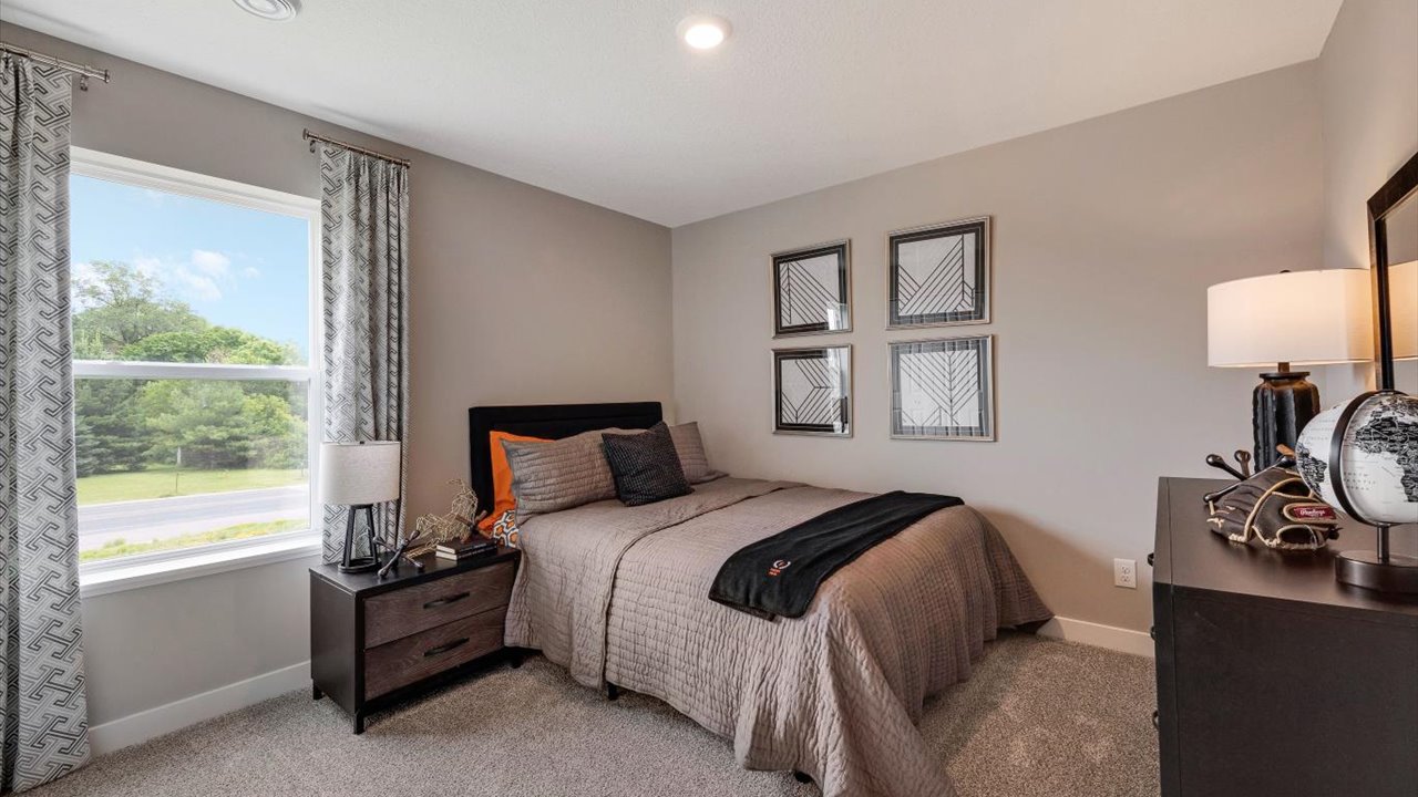 bedroom with neutral decorations and corner bedroom.