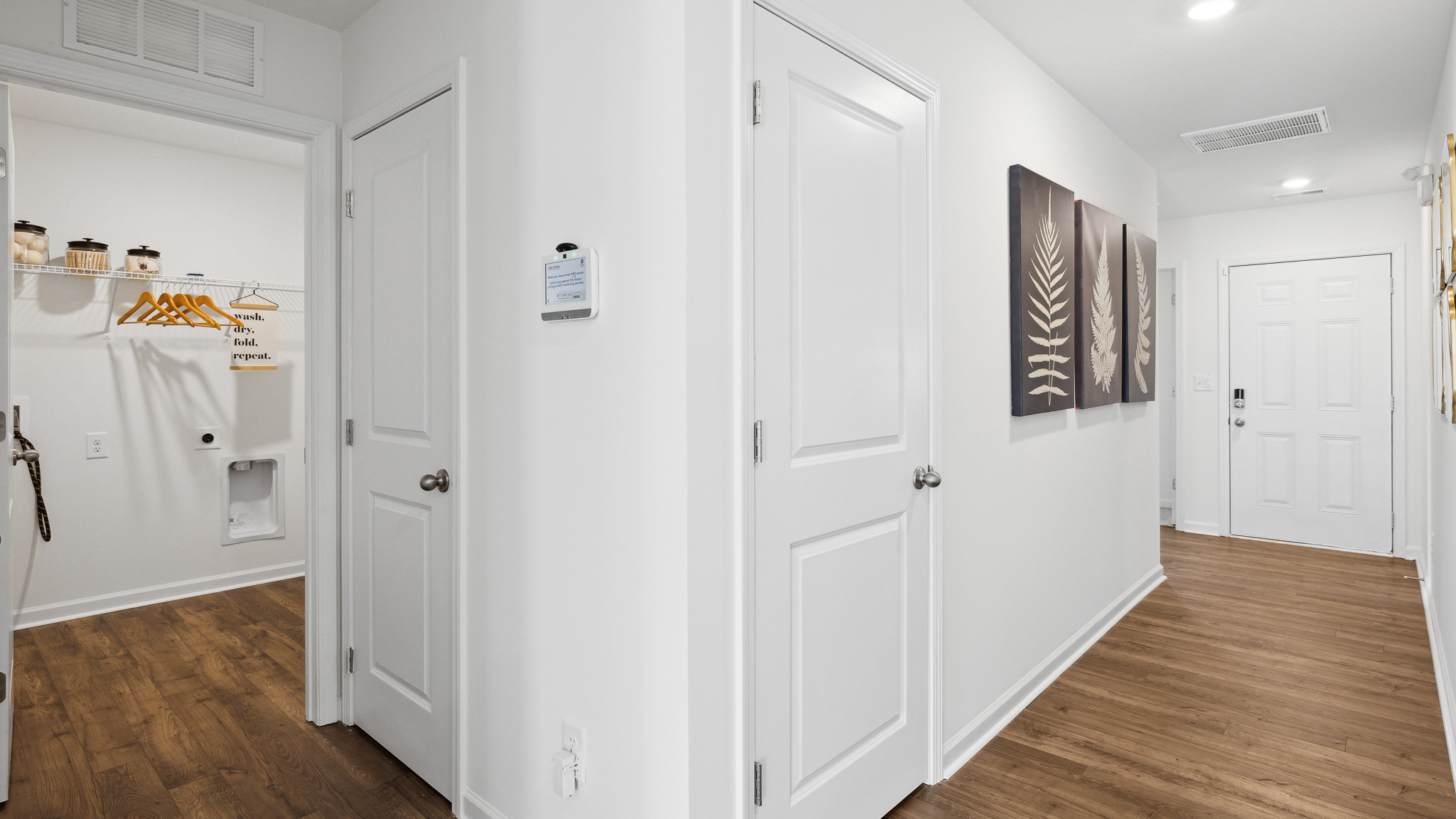 Hallway leading to front door.