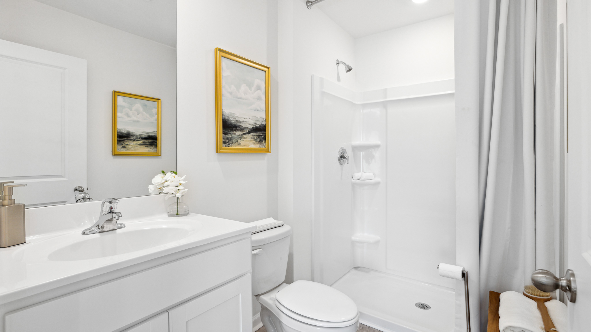 Bathroom with vanity and walk-in shower