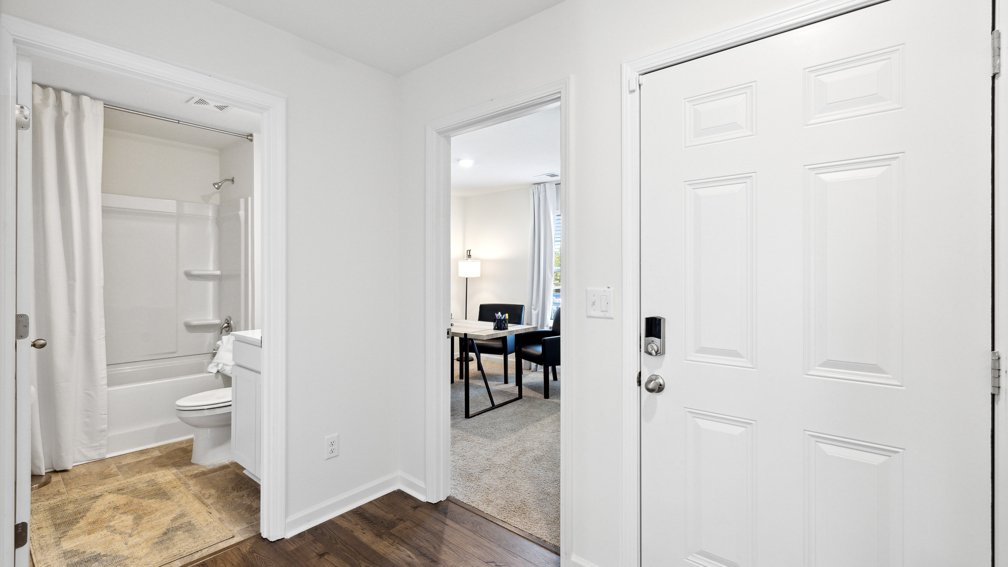 Hallway looking into bathroom and flex room.