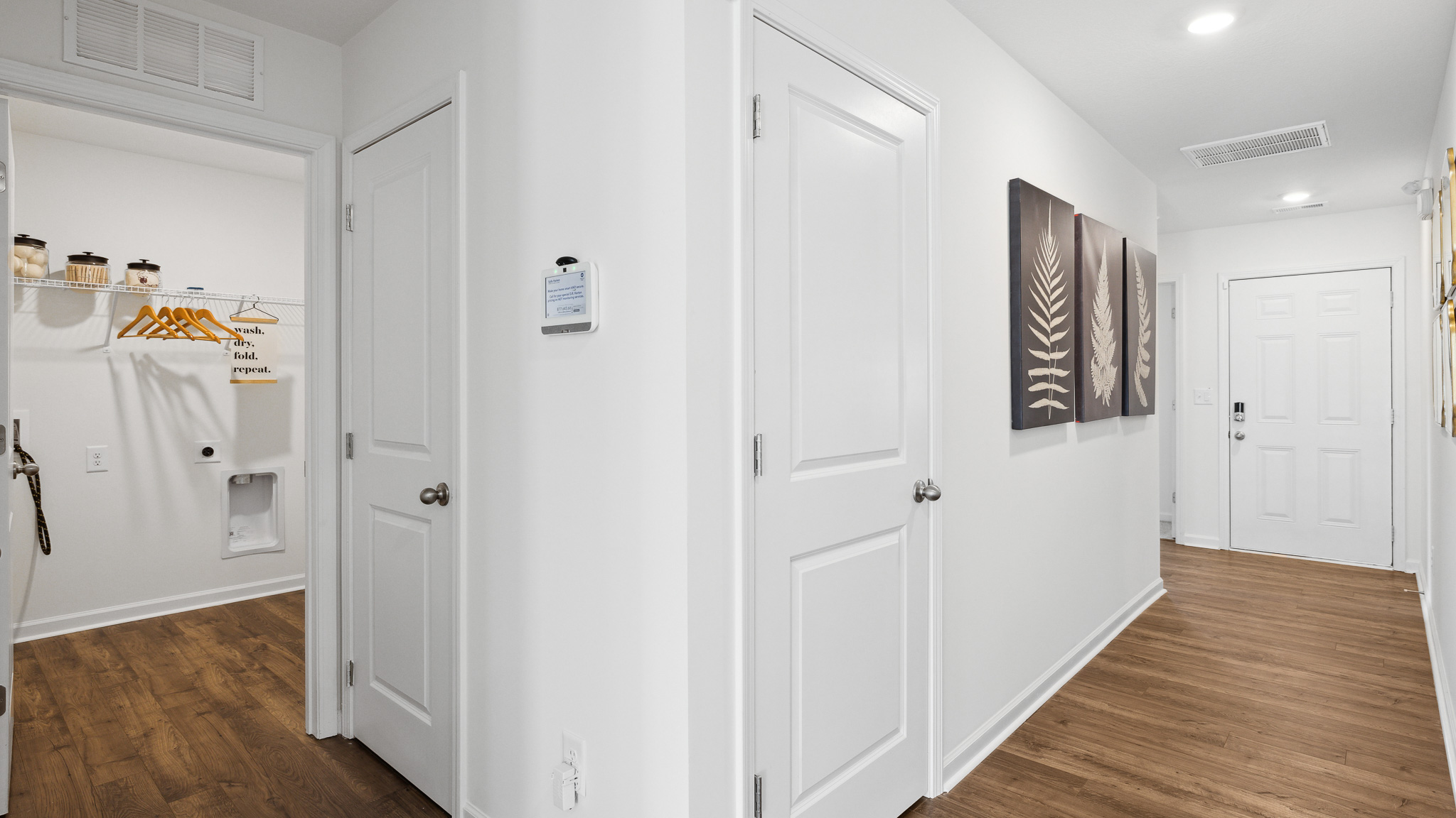 Hallway leading to front door.