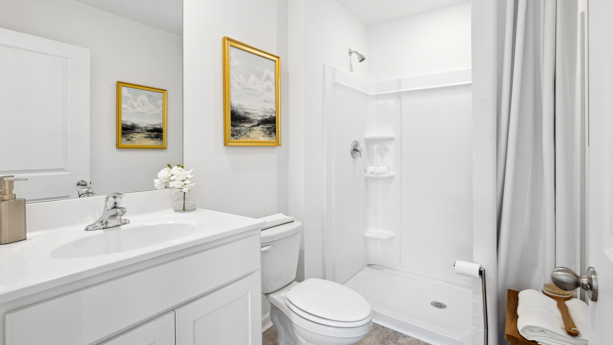 Bathroom with vanity and walk-in shower
