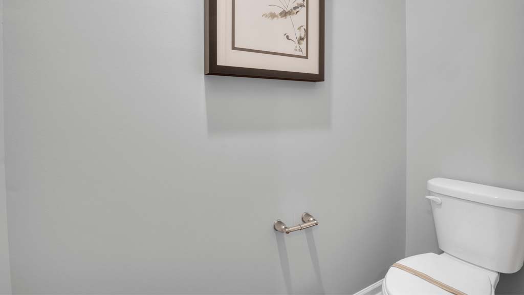 close up of dual vanity sinks in private primary bathroom.