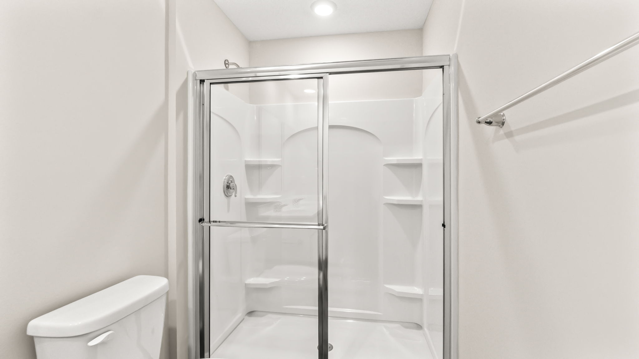closeup of sliding glass shower door