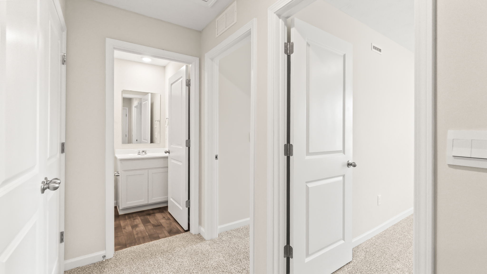 Upstairs hallway leading to bathroom and bedroom