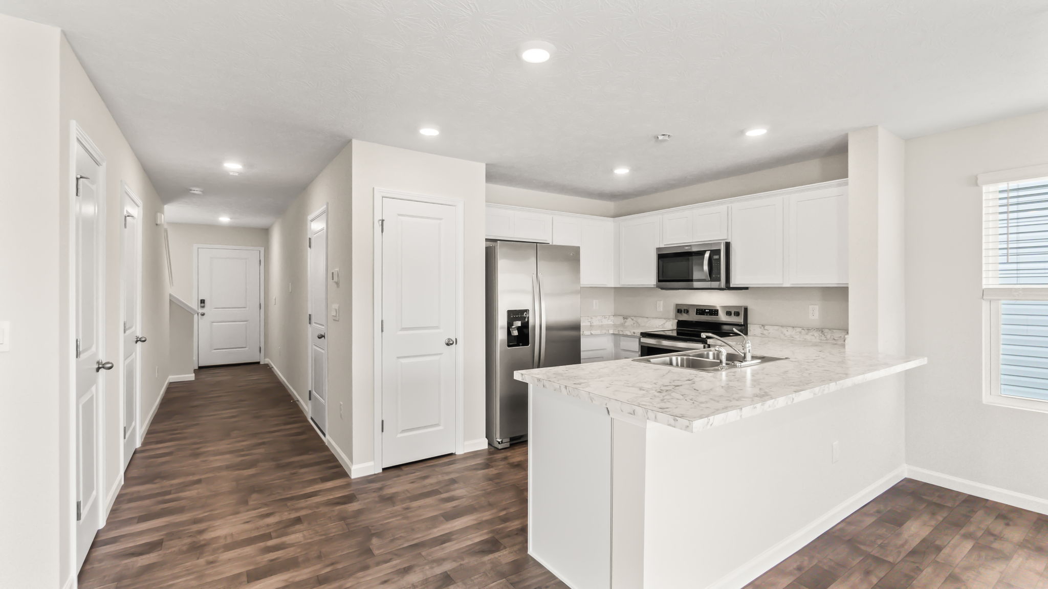 three quarter view of full kitchen