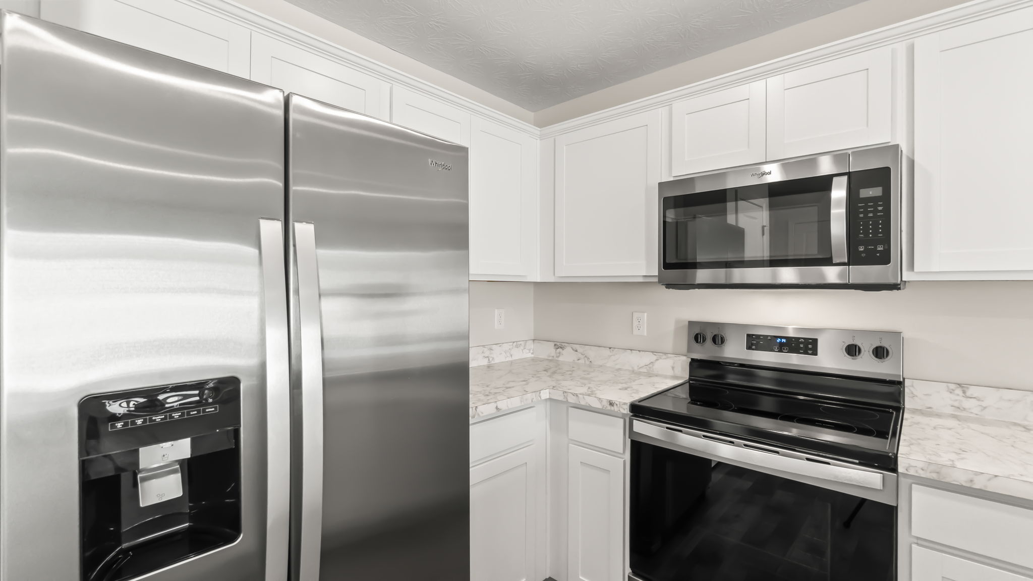 closeup of refrigerator and oven range